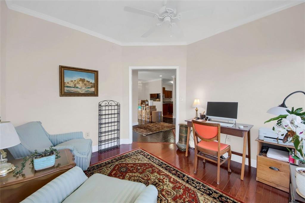 5364 Brooke Ridge Drive Dunwoody, GA 30338 - Photo 13 of 34 a living room with furniture and a flat screen tv
