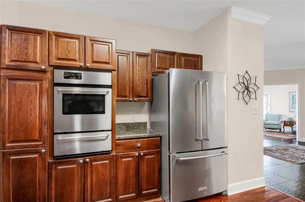5364 Brooke Ridge Drive Dunwoody, GA 30338 - Photo 19 of 34 a kitchen with stainless steel appliances and refrigerator