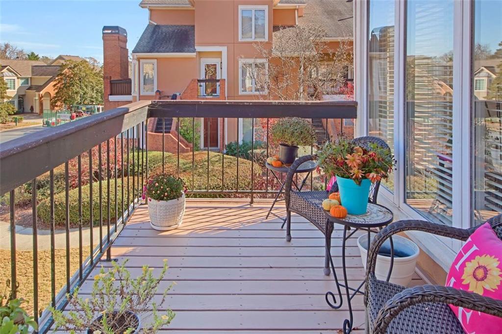 5364 Brooke Ridge Drive Dunwoody, GA 30338 - Photo 31 of 34 a balcony with furniture and flowers