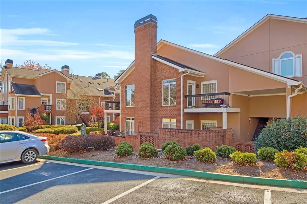 5364 Brooke Ridge Drive Dunwoody, GA 30338 - Photo 33 of 34 a front view of a residential houses with yard