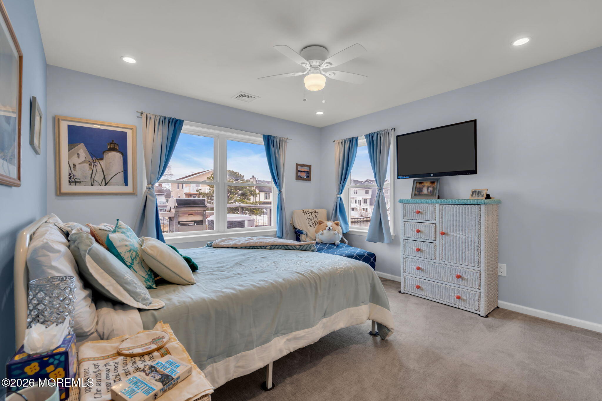 1622 Center Street Point Pleasant, NJ 08742 - Photo 22 of 42 a bedroom with a bed and a flat screen tv