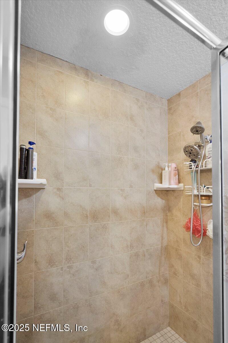 53347 Clear Lake Drive Callahan, FL 32011 - Photo 21 of 41 a bathroom with a shower