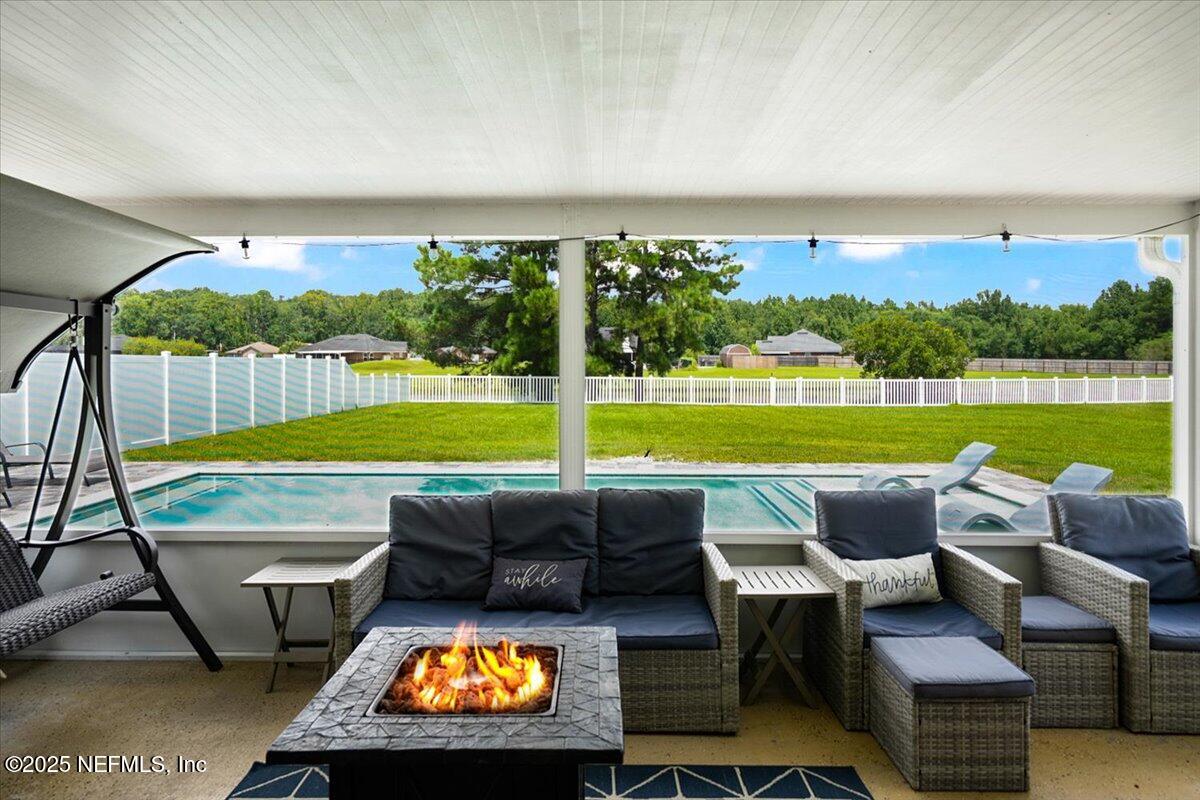 53347 Clear Lake Drive Callahan, FL 32011 - Photo 24 of 41 a view of swimming pool with seating area and furniture