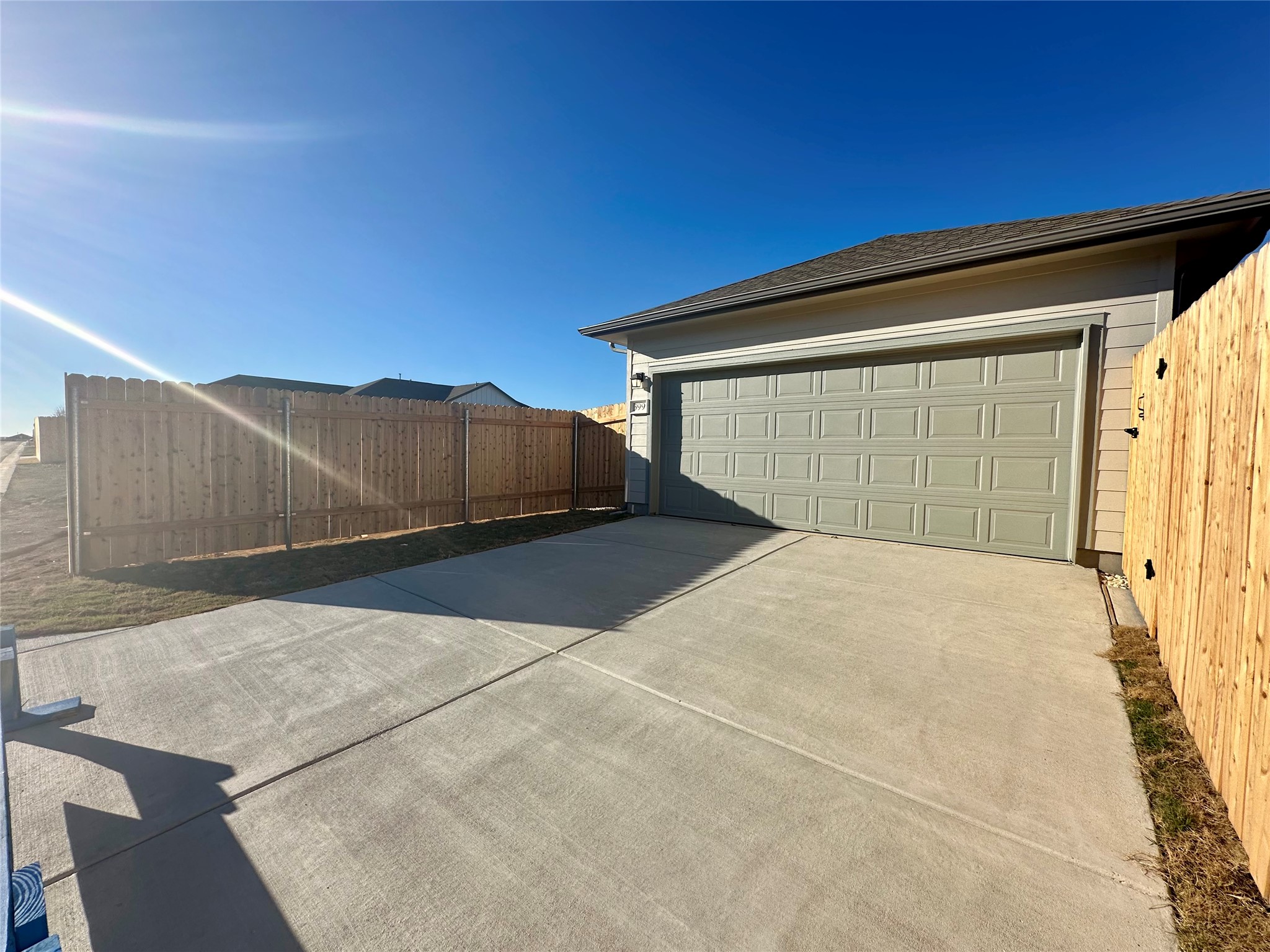 399 Porter Country Parkway Buda, TX 78610 - Photo 25 of 30 a view of a garage