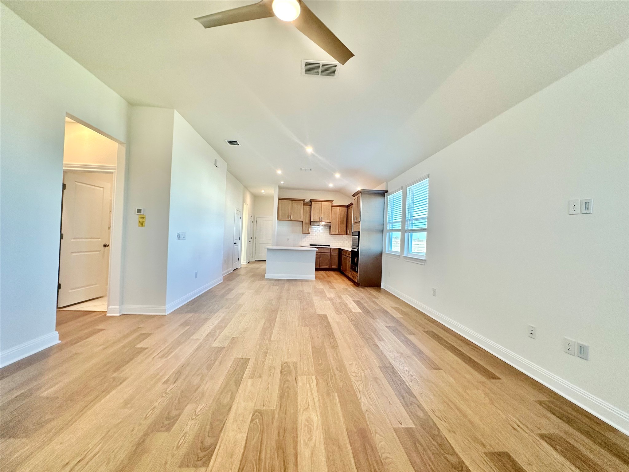 399 Porter Country Parkway Buda, TX 78610 - Photo 6 of 30 a view of empty room with wooden floor
