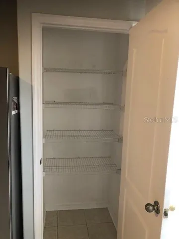 a bathroom with a glass door shower