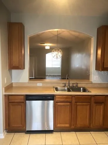 a bathroom with a sink a vanity and a mirror