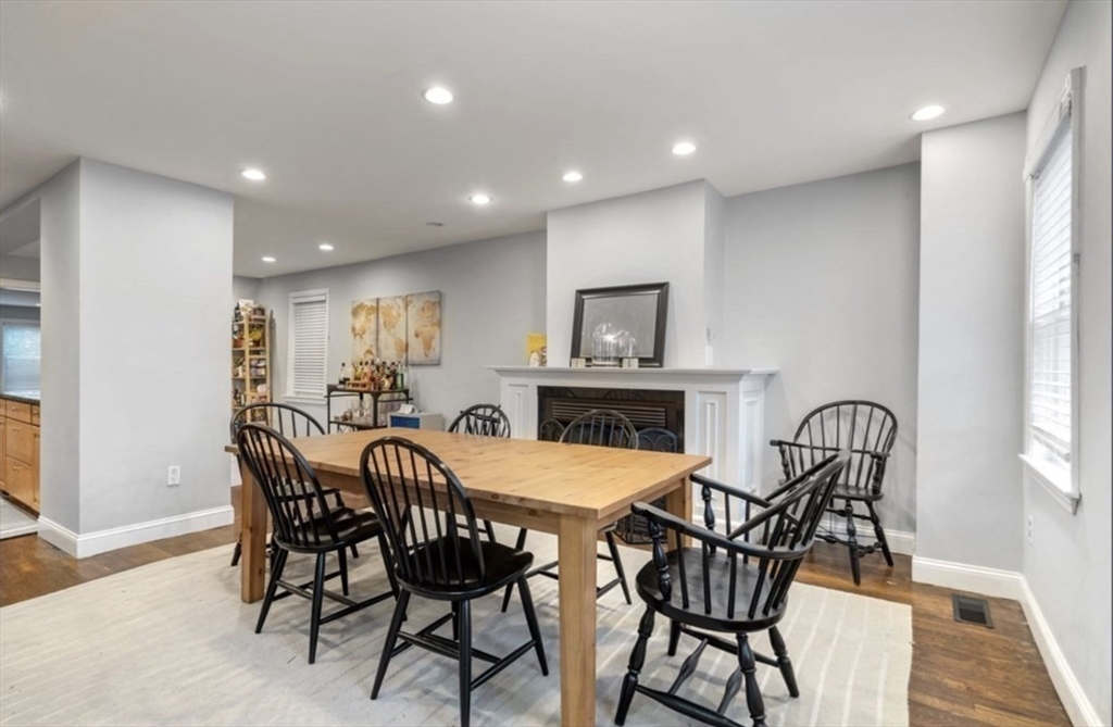 159 N Street Boston, MA 02127 - Photo 3 of 13 a view of a dining room with furniture and a window
