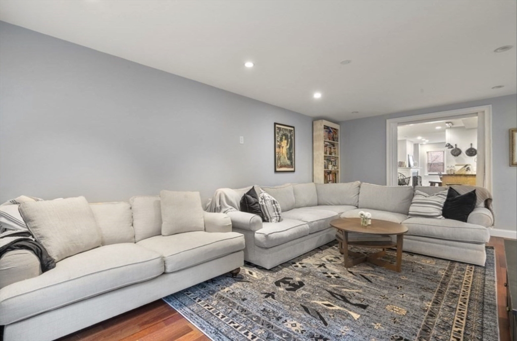 159 N Street Boston, MA 02127 - Photo 6 of 13 a living room with furniture and a large window