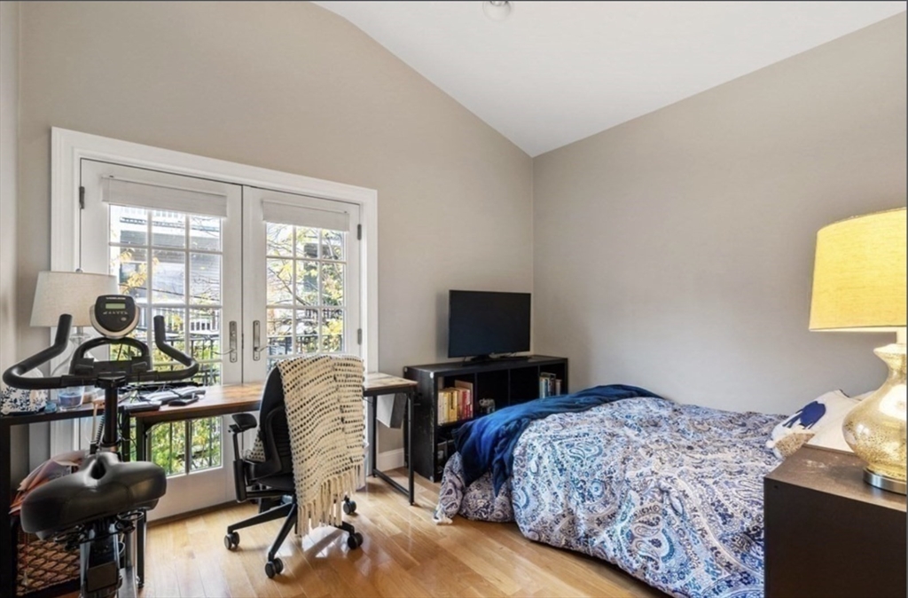159 N Street Boston, MA 02127 - Photo 8 of 13 a bedroom with furniture and a window