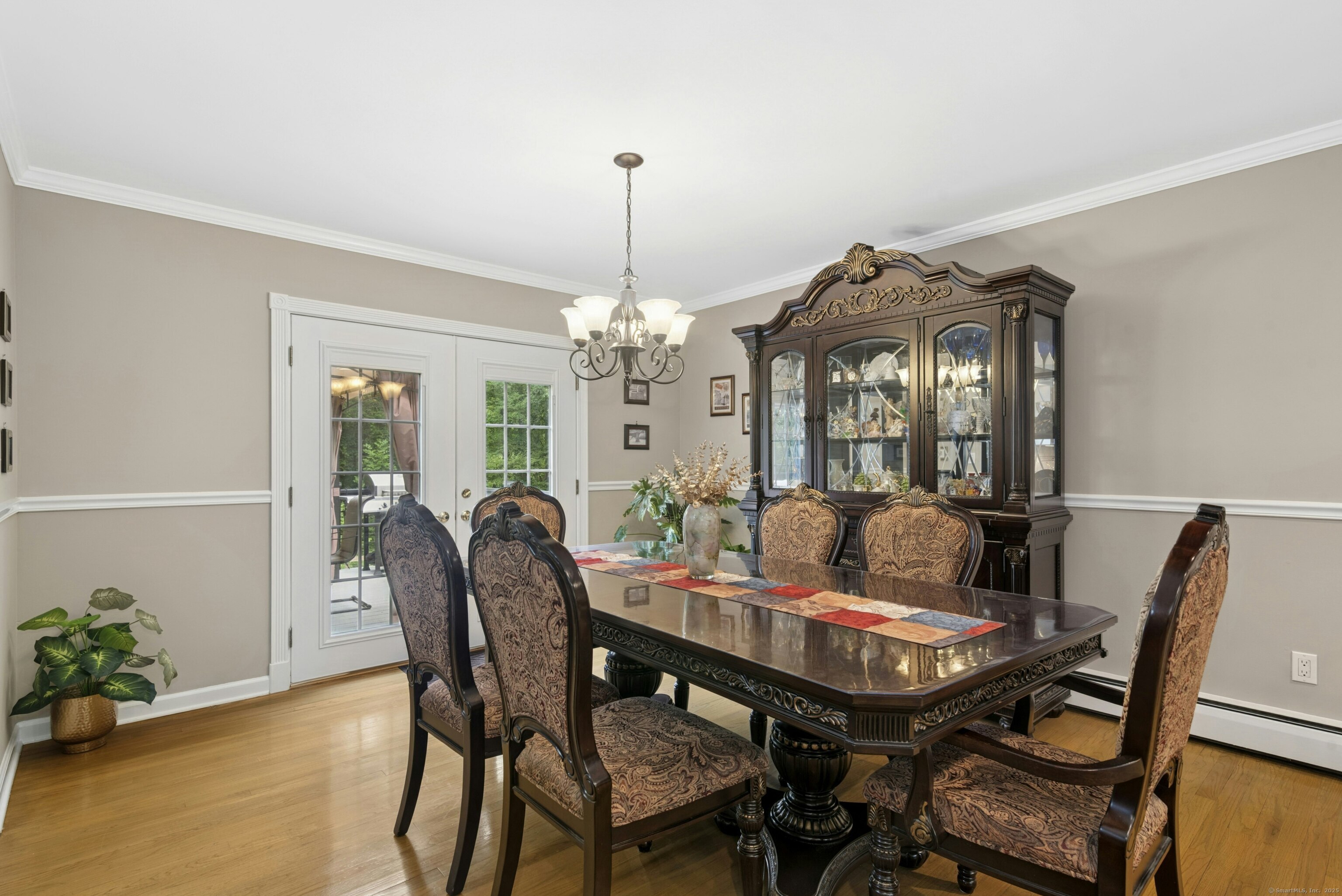40 Winthrop Place Monroe, CT 06468 - Photo 13 of 38 a view of a dining room with furniture and chandelier
