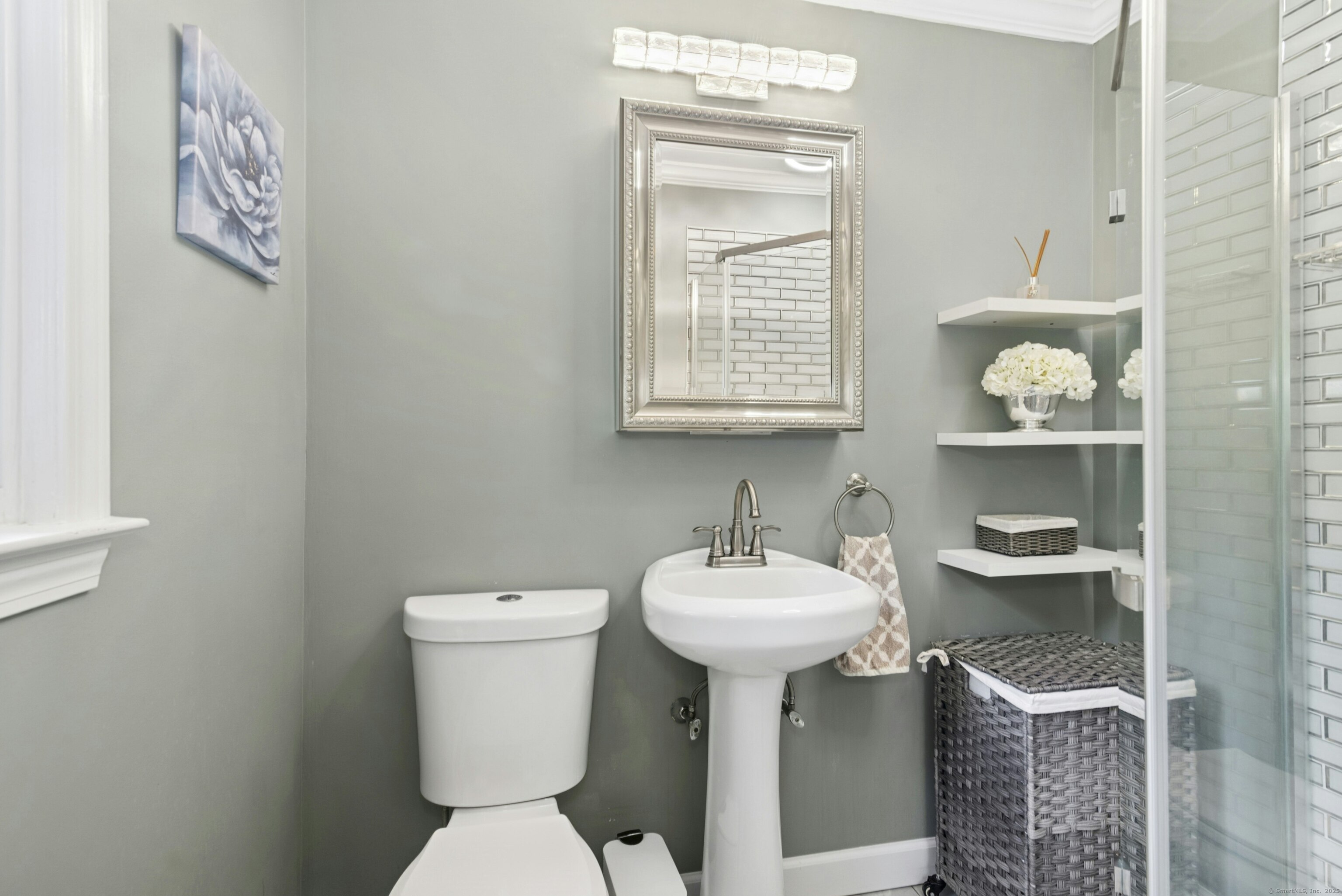 40 Winthrop Place Monroe, CT 06468 - Photo 20 of 38 a bathroom with a sink toilet and a mirror