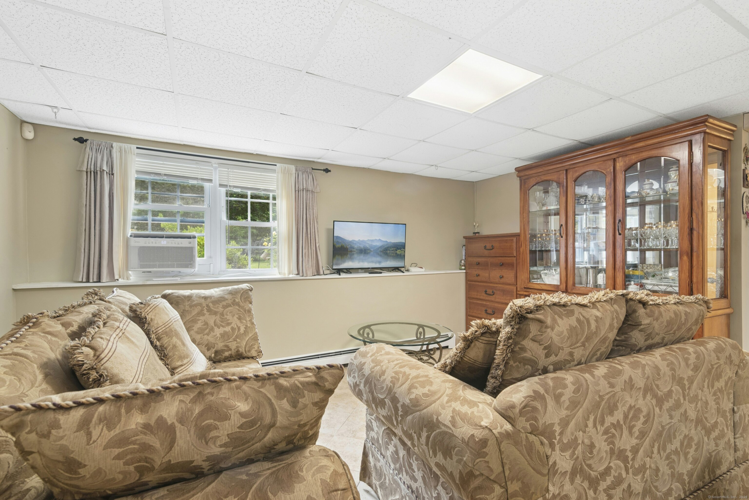 40 Winthrop Place Monroe, CT 06468 - Photo 24 of 38 a living room with a couch and a large window