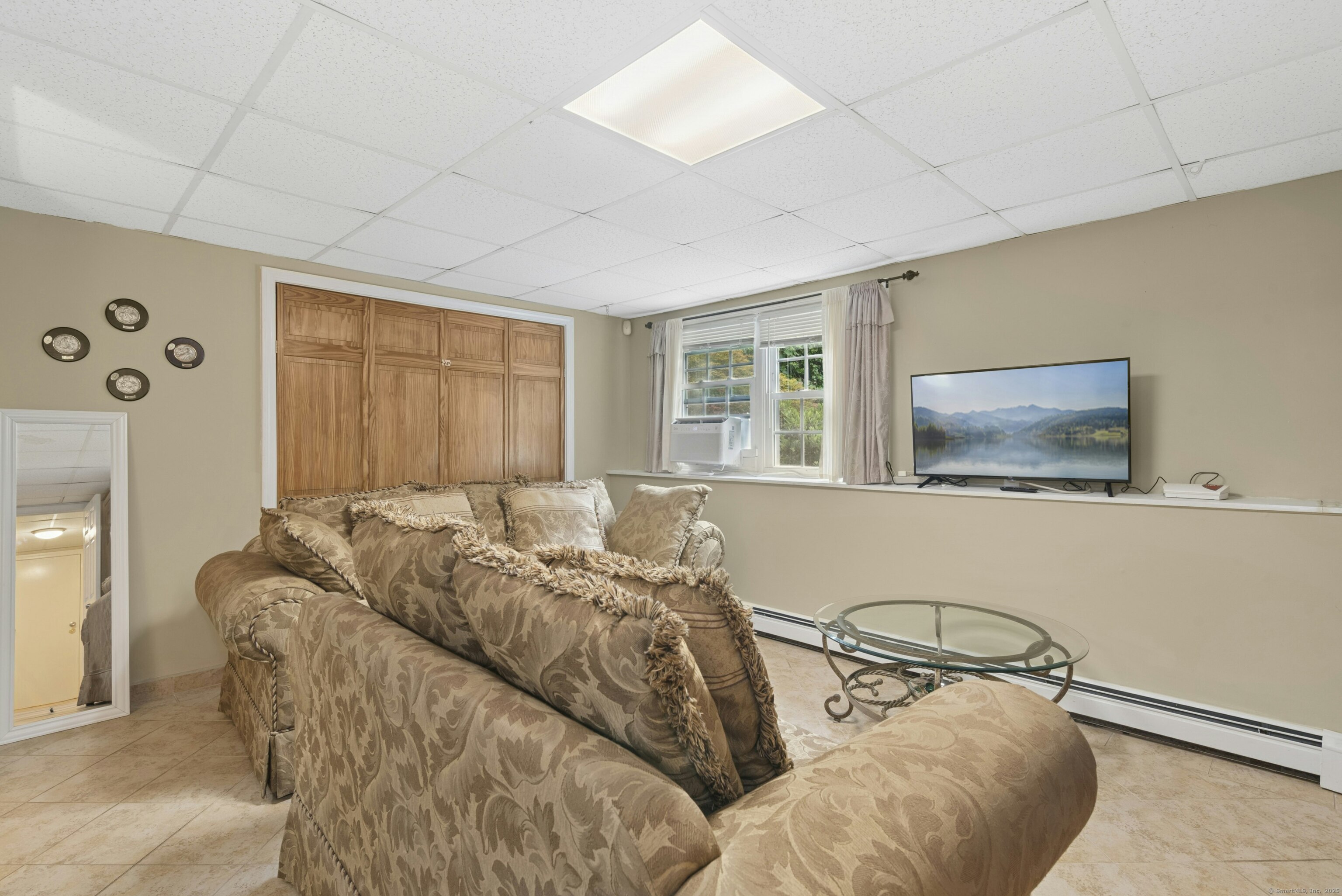 40 Winthrop Place Monroe, CT 06468 - Photo 25 of 38 a bedroom with furniture and a window