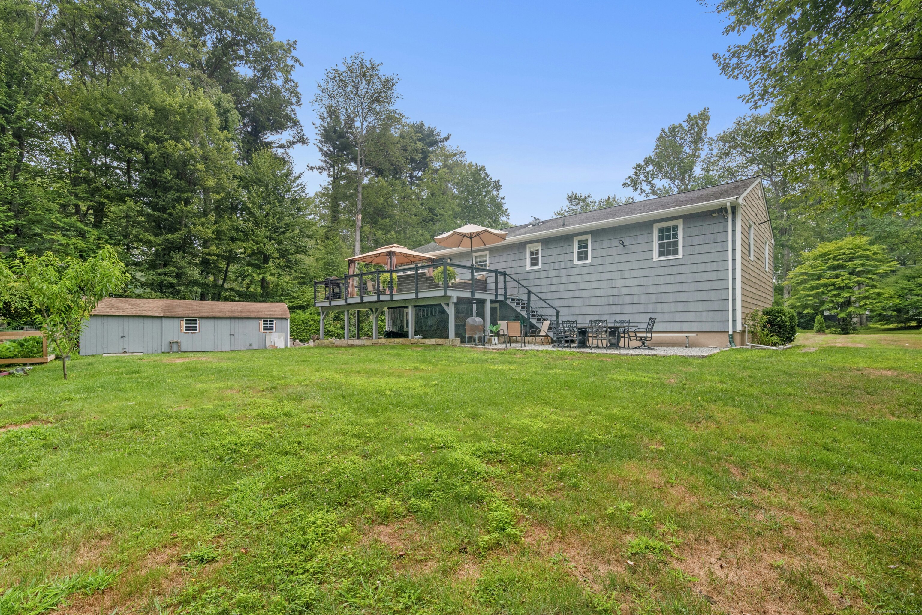 40 Winthrop Place Monroe, CT 06468 - Photo 33 of 38 a front view of house with yard and trees