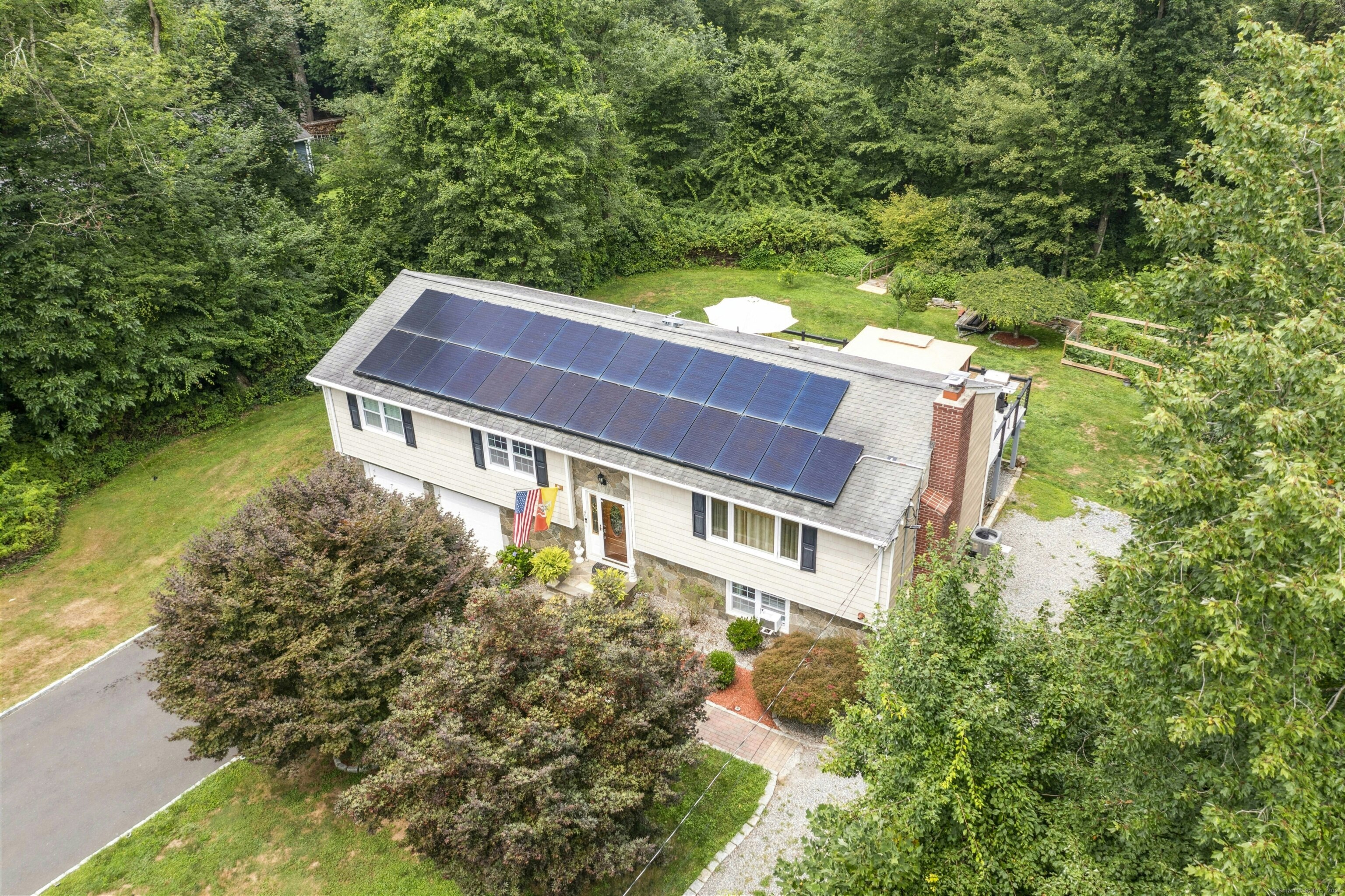 40 Winthrop Place Monroe, CT 06468 - Photo 5 of 38 front view of a house with a yard