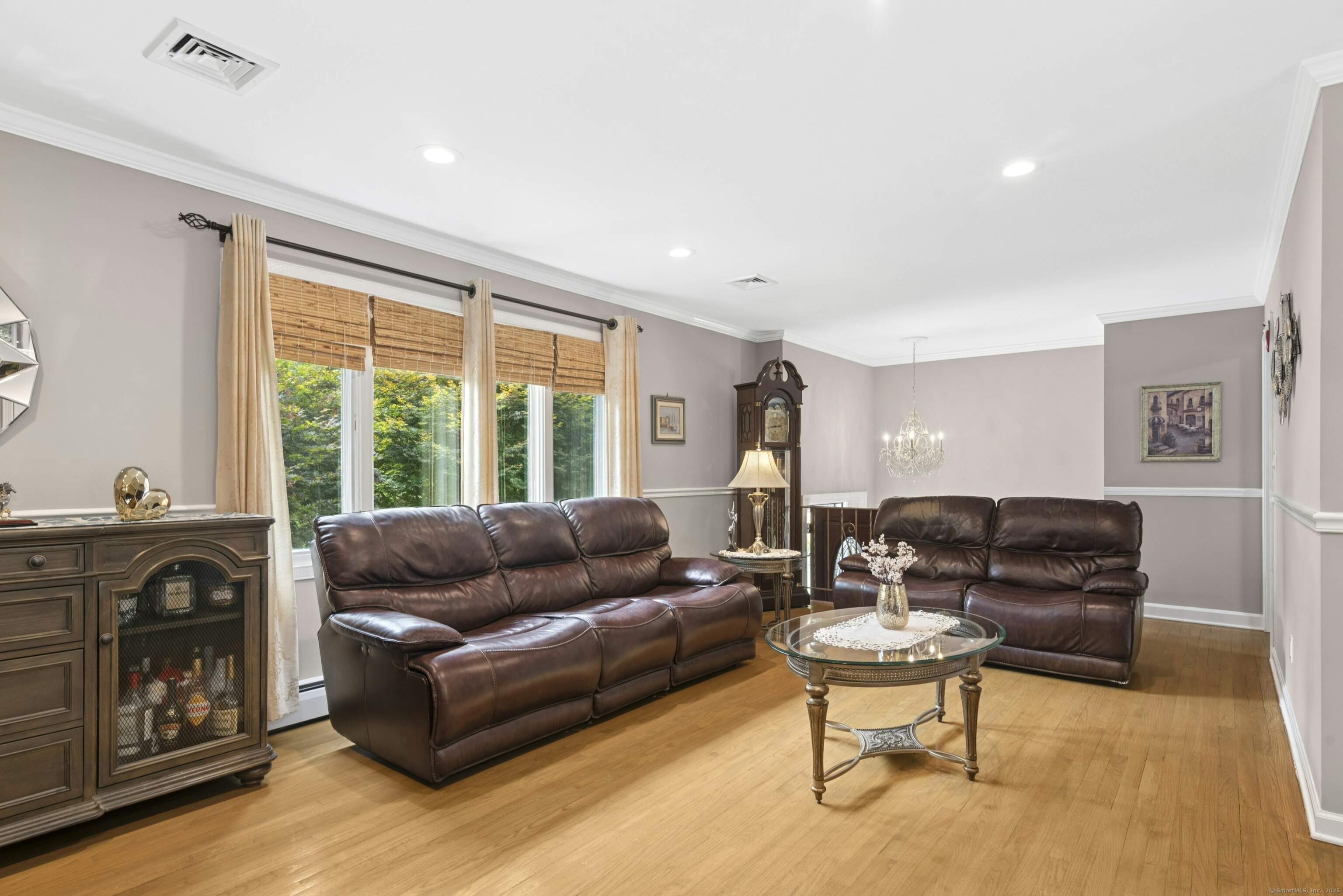 40 Winthrop Place Monroe, CT 06468 - Photo 10 of 38 a living room with furniture and a flat screen tv