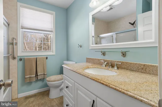 a room with furniture and a window