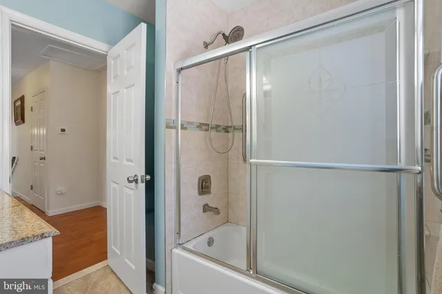 a living room with furniture and flat screen tv