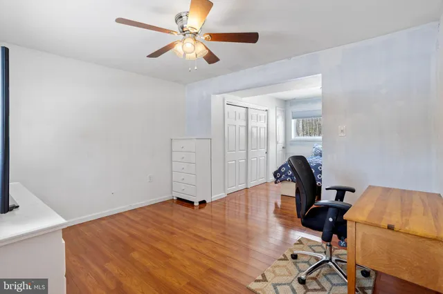 a bathroom with a shower and a toilet