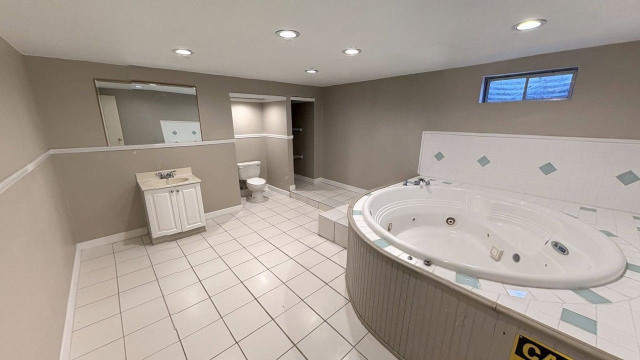 10662 Chicory Ridge Way Roscoe, IL 61073 - Photo 28 of 37 a bathroom with a bathtub and a sink