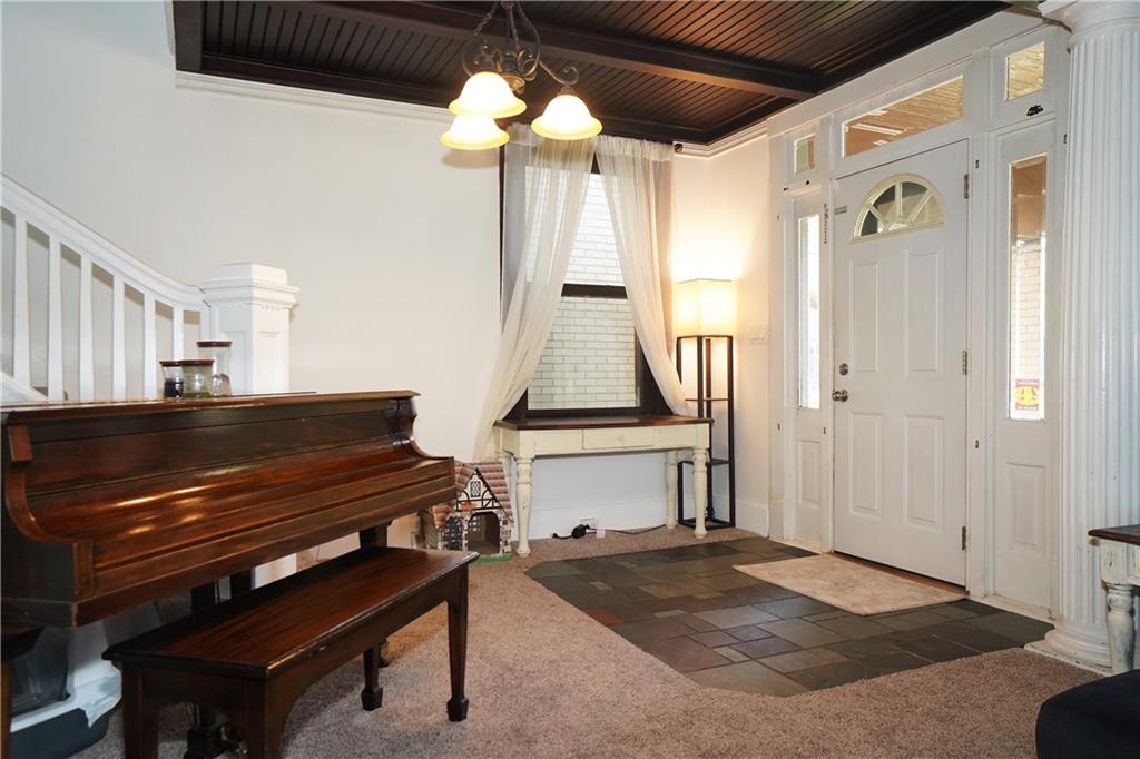 124 Hazel Street Kittanning, PA 16201 - Photo 7 of 26 a view of a livingroom with furniture and chandelier