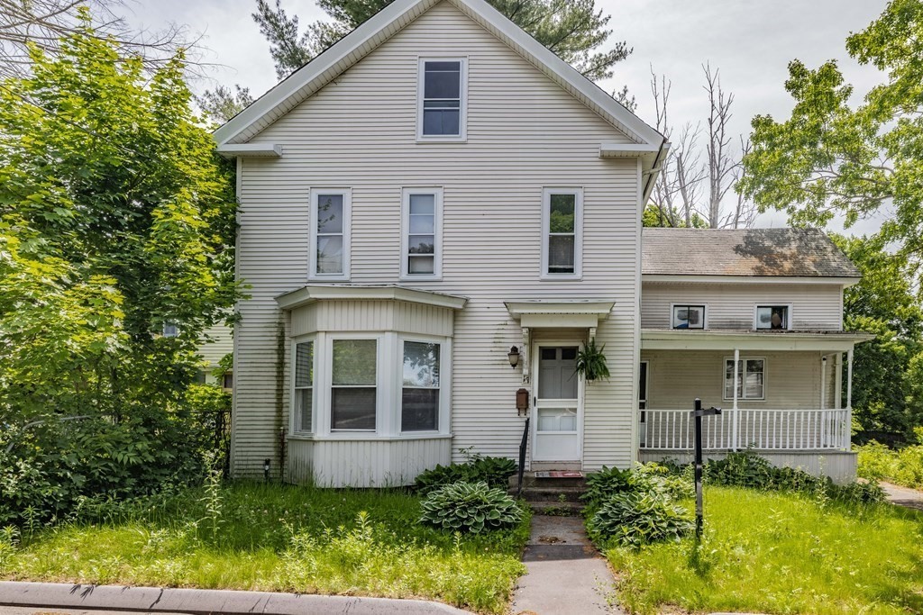 17 Spring Street Ware, MA 01082 - Photo 14 of 28 a front view of a house with garden