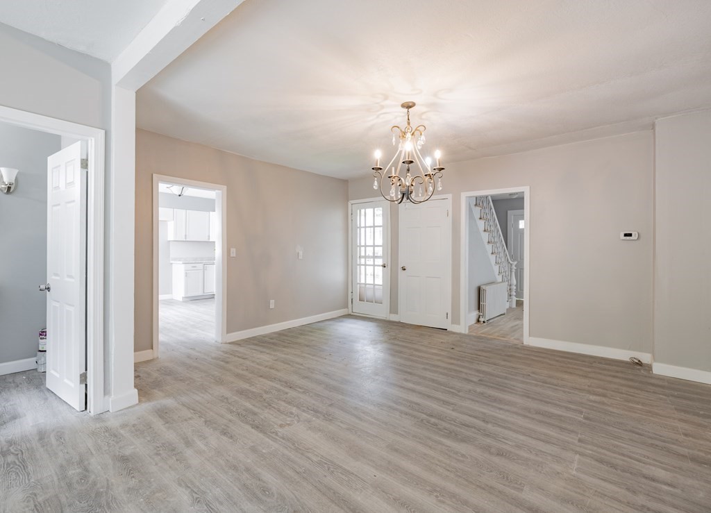 17 Spring Street Ware, MA 01082 - Photo 20 of 28 a view of a livingroom with a chandelier