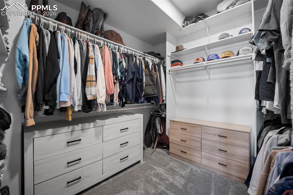 16535 Sweet Road Peyton, CO 80831 - Photo 19 of 45 a view of a walk in closet