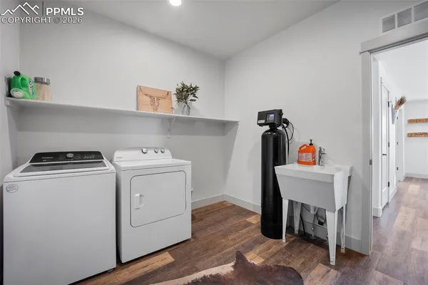 a utility room with dryer and washer