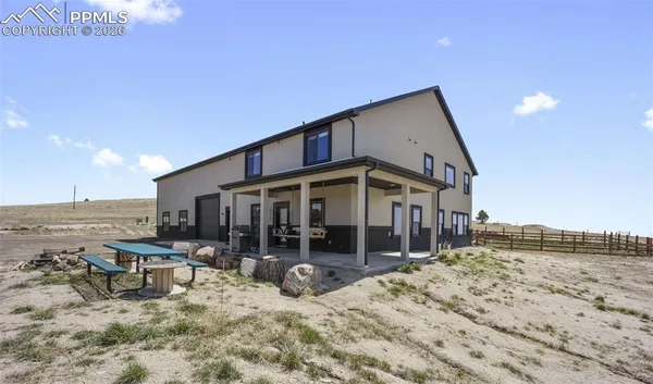 a view of a house with a patio