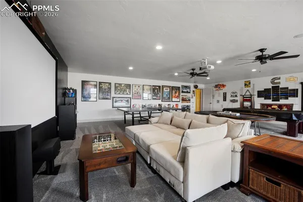 a living room with furniture and a table
