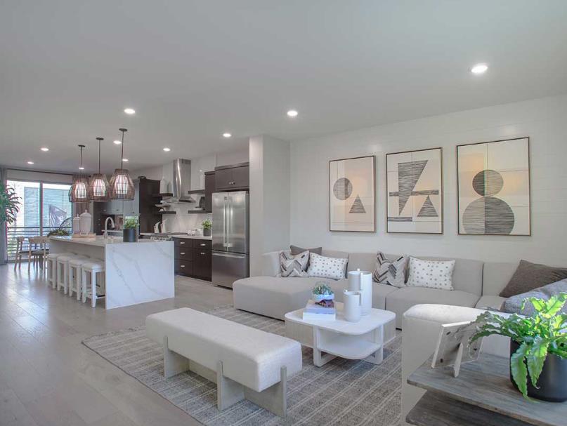 6617 Optimun Loop San Jose, CA 95119 - Photo 3 of 8 a living room with furniture and kitchen view