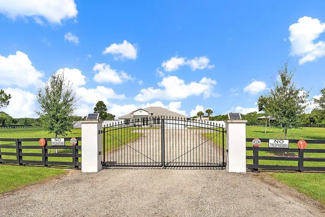 a view of a house with a big yard