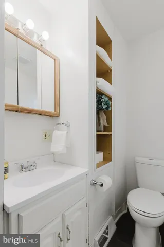 a bathroom with a sink and a toilet