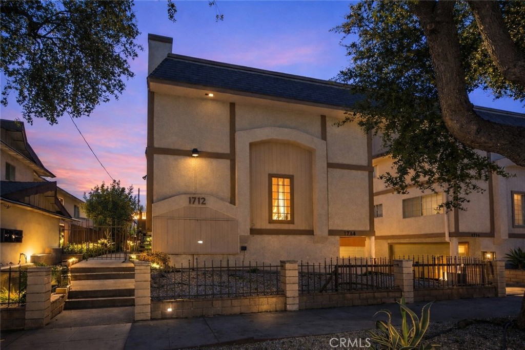 1712 Pepper Street, Unit A Alhambra, CA 91801 - Photo 1 of 1 a front view of a house with a yard