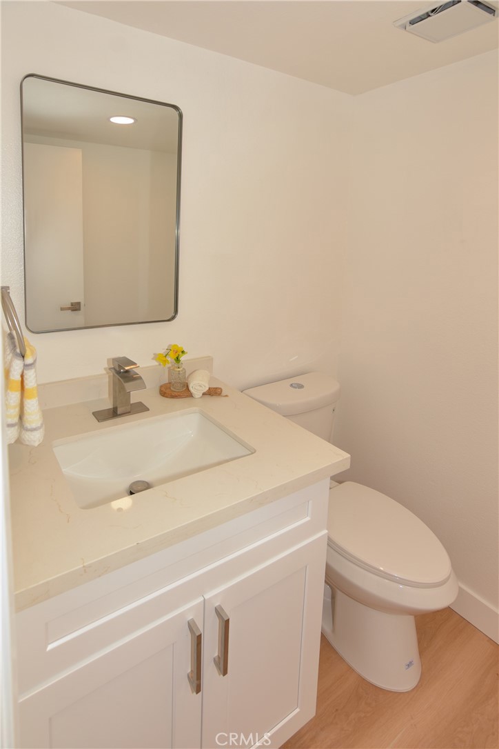 1712 Pepper Street, Unit A Alhambra, CA 91801 - Photo 18 of 39 a bathroom with a toilet sink and mirror