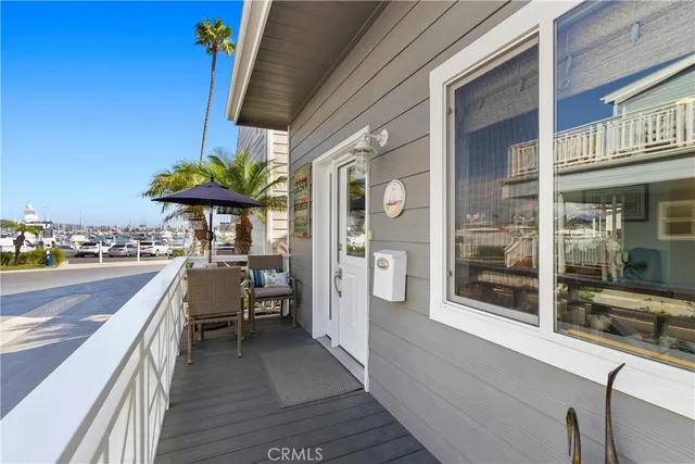 a view of a balcony with chairs