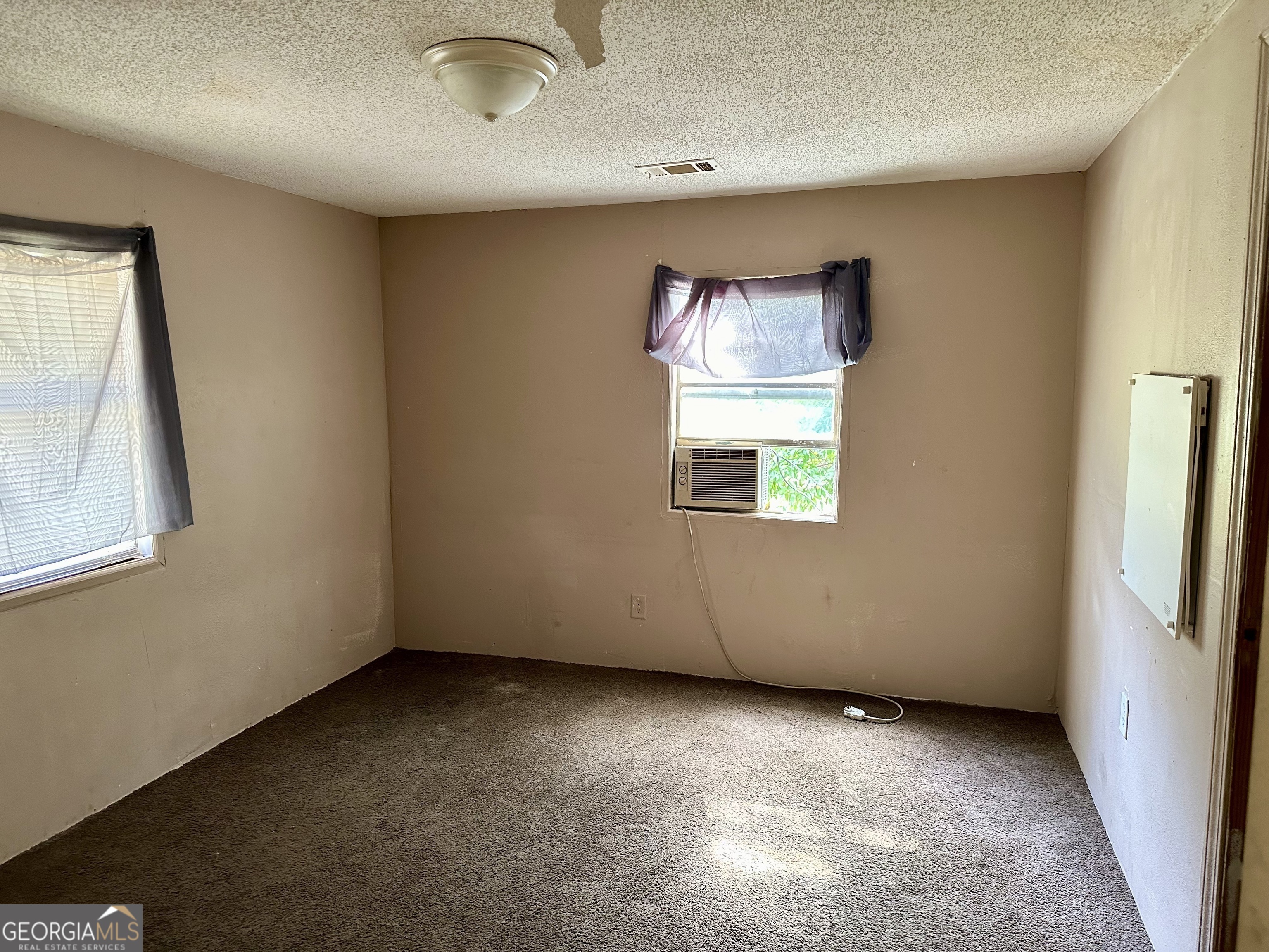 2155 Ferguson Street Macon, GA 31204 - Photo 14 of 17 an empty room with windows