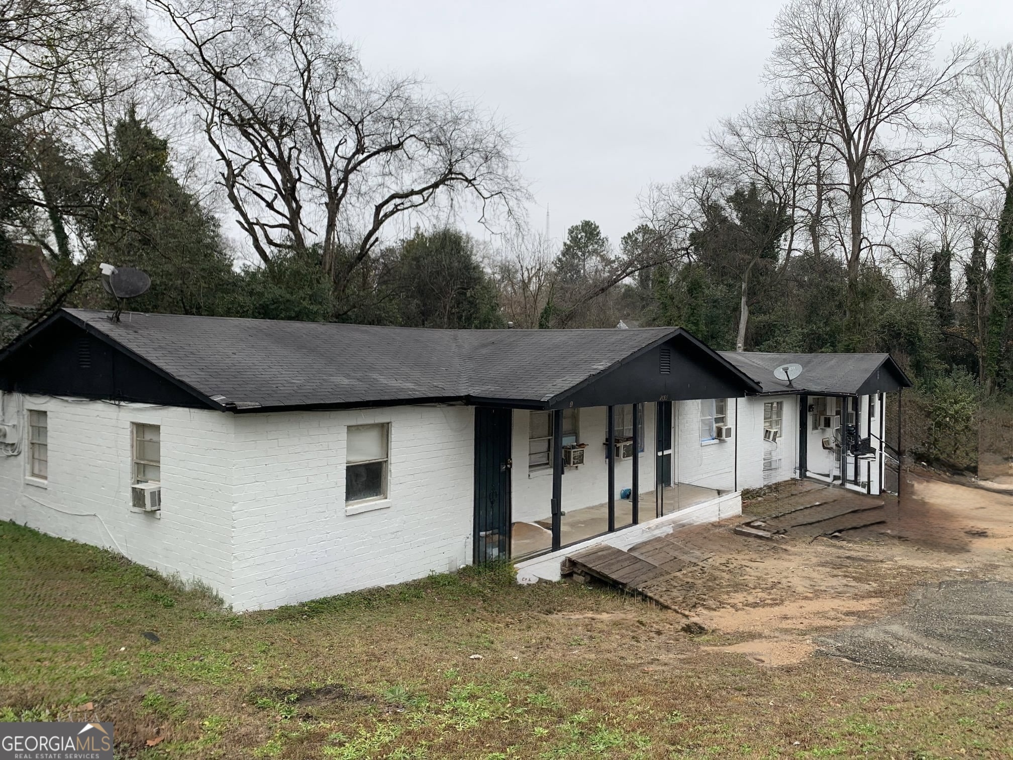 2155 Ferguson Street Macon, GA 31204 - Photo 2 of 17 a front view of a house with a yard