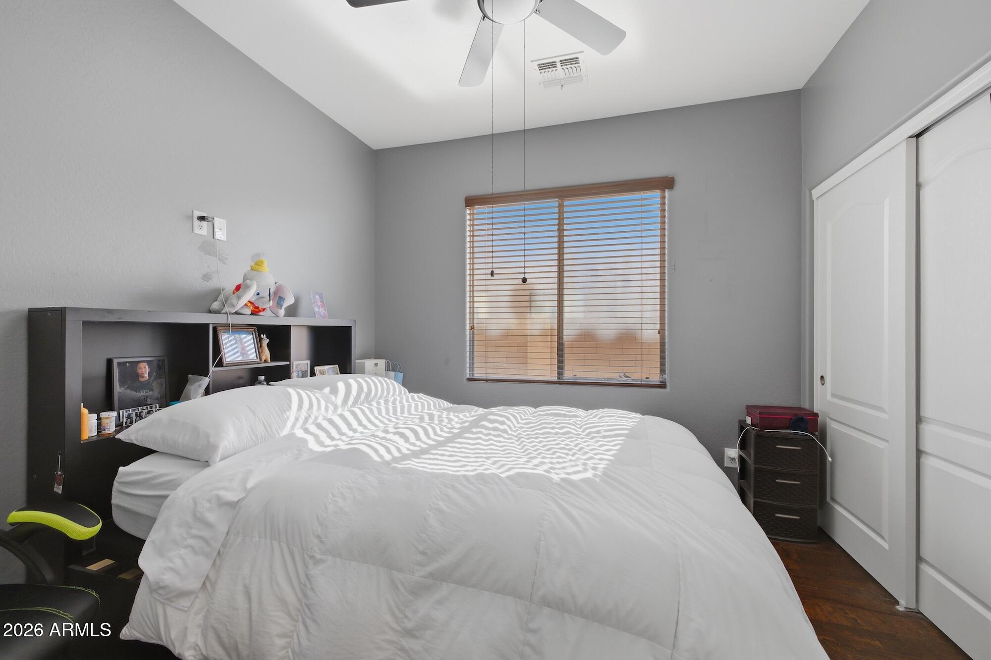 3605 South Danielson Way Chandler, AZ 85286 - Photo 9 of 23 a bedroom with a bed and a window