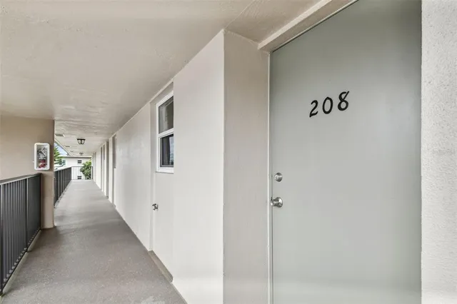 a hallway with a white walls