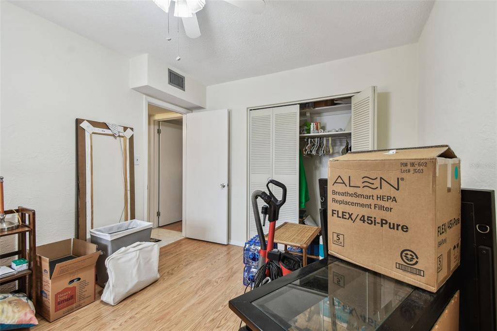 9945 47th Avenue North, Unit 208 St. Petersburg, FL 33708 - Photo 21 of 38 a room with furniture and air hockey table