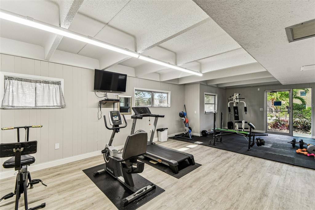 9945 47th Avenue North, Unit 208 St. Petersburg, FL 33708 - Photo 29 of 38 a view of a room with gym equipment