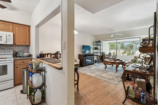 a view of a kitchen and dining room