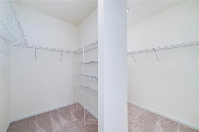 a view of a room with racks on the wall