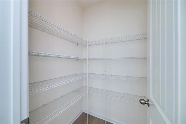 a empty closet with white paint