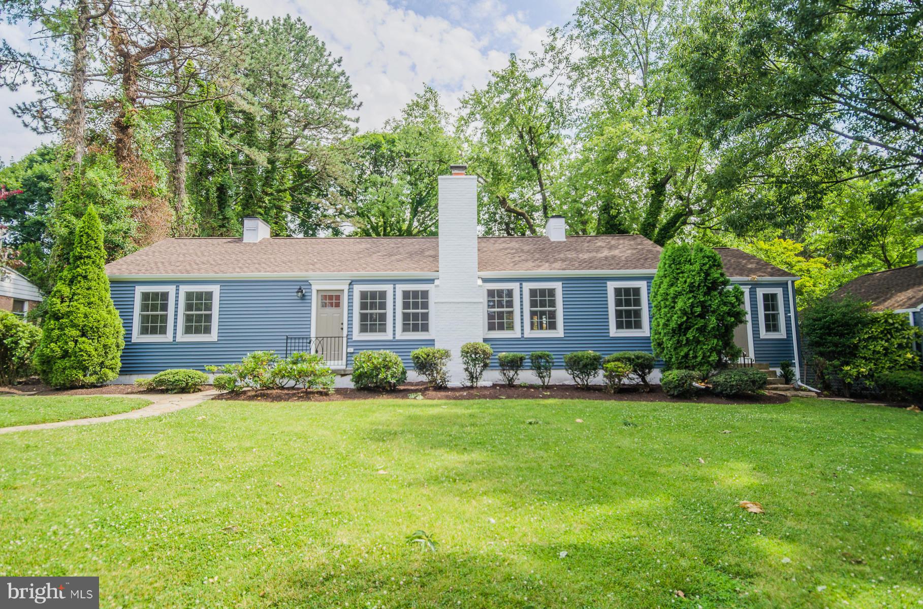 181 Hollen Road Baltimore, MD 21212 - Photo 29 of 30 a front view of a house with a yard and trees