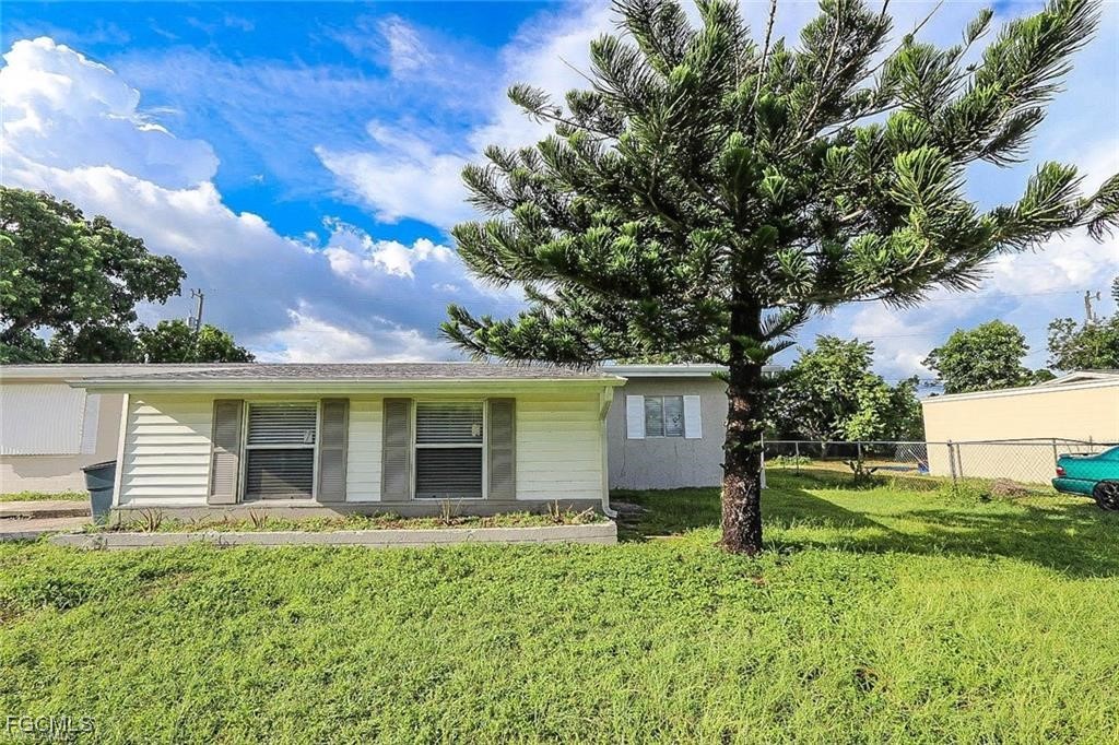 305 Bougainvillea Road West Lehigh Acres, FL 33936 - Photo 1 of 18