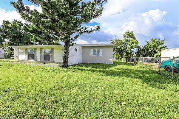 $1,320 | 305 Bougainvillea Road West, Lehigh Acres, FL 33936